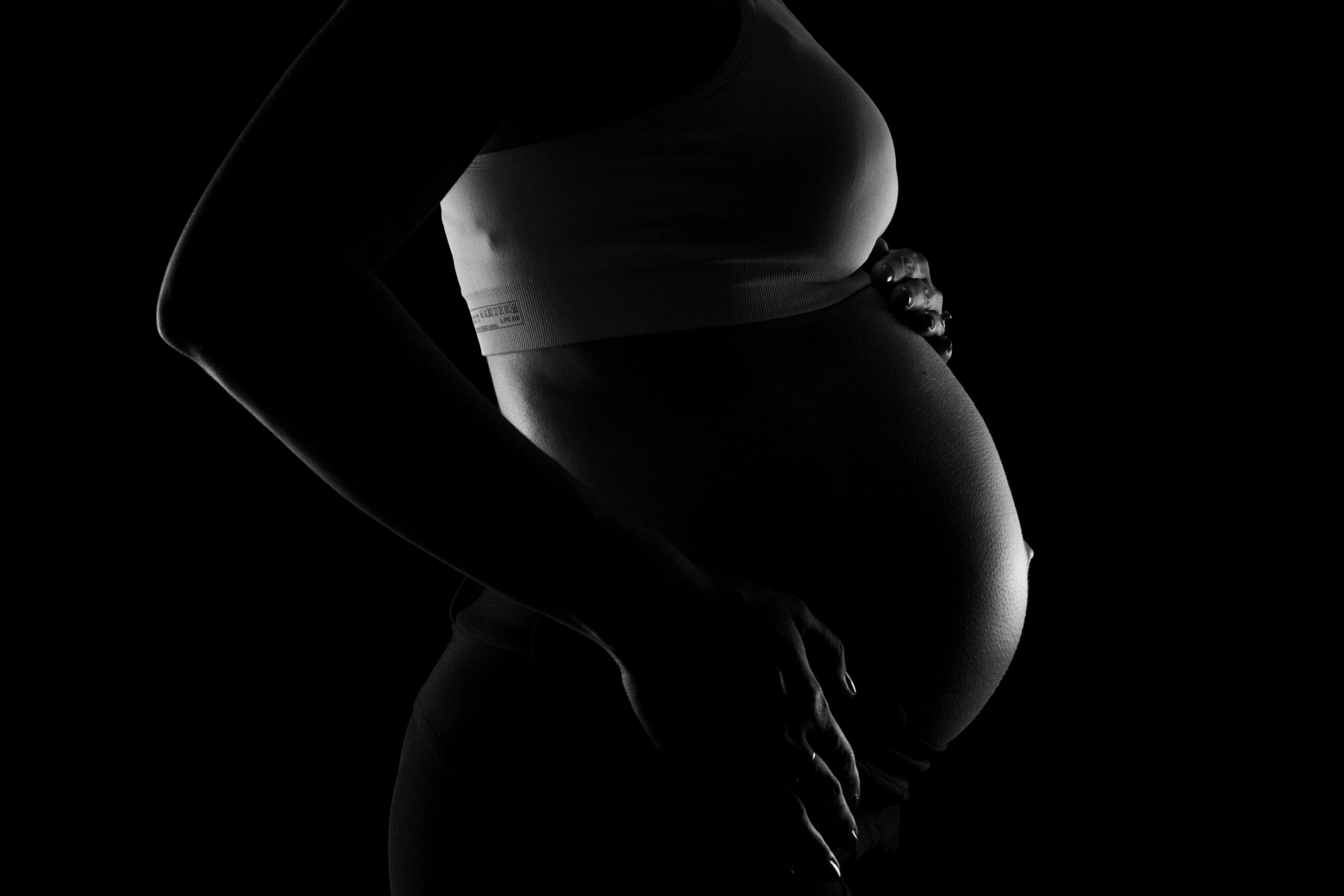 Pregnant woman anticipating the need for birth trauma therapy