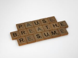 scrabble letters, three lines: pause, breathe, resume therapist for ocd near me